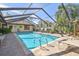 Large screened-in pool and patio area, perfect for outdoor living at 14031 Shady Shores Dr, Tampa, FL 33613