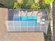 An inground swimming pool with a screened enclosure at 14031 Shady Shores Dr, Tampa, FL 33613