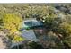 Aerial view of two tennis courts and playground at 14031 Shady Shores Dr, Tampa, FL 33613