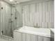 Spa-like bathroom with walk-in shower and soaking tub at 145 2Nd S Ave # 616, St Petersburg, FL 33701