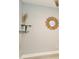 Bedroom features a sun-shaped mirror and decorative shelving at 145 2Nd S Ave # 616, St Petersburg, FL 33701