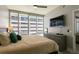 Bright bedroom featuring a king-size bed and modern dresser at 145 2Nd S Ave # 616, St Petersburg, FL 33701