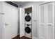 Convenient laundry closet features stacked washer and dryer units, maximizing space at 145 2Nd S Ave # 616, St Petersburg, FL 33701