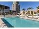 Community pool with surrounding deck and lounge chairs at 145 2Nd S Ave # 616, St Petersburg, FL 33701