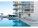 Luxurious pool area with lounge chairs and stunning building views, perfect for relaxation and enjoying the scenery at 145 2Nd S Ave # 616, St Petersburg, FL 33701