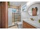 Stylish bathroom with walk-in shower and updated vanity at 1512 Big Bass Dr, Tarpon Springs, FL 34689