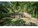 Wooden walkway through lush park foliage at 1512 Big Bass Dr, Tarpon Springs, FL 34689