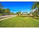 Gated community entrance with attractive landscaping at 16130 Craigend Pl, Odessa, FL 33556