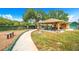 Relaxing community pavilion with picnic tables and benches at 16130 Craigend Pl, Odessa, FL 33556