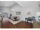 Dining room with dark wood table and access to living room at 16130 Craigend Pl, Odessa, FL 33556