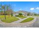 View of the home's exterior and landscaping at 16130 Craigend Pl, Odessa, FL 33556