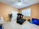 Versatile room with neutral tones, great light, tile floors, suitable for a bedroom, home gym, or flex space at 1632 Gray Bark Dr, Oldsmar, FL 34677