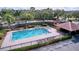 Community pool and recreation area features a clean, well-maintained swimming pool with lounge chairs at 1632 Gray Bark Dr, Oldsmar, FL 34677