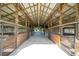 View down the center aisle of the barn at 17120 Boy Scout Rd, Odessa, FL 33556