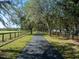 Long paved driveway leading to home at 17120 Boy Scout Rd, Odessa, FL 33556