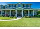 Two-story home with a covered porch and manicured lawn at 17120 Boy Scout Rd, Odessa, FL 33556