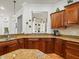 Kitchen with granite countertops, double sink, and wood cabinets at 17120 Boy Scout Rd, Odessa, FL 33556