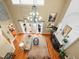 High-ceilinged living room with hardwood floors and fireplace at 17120 Boy Scout Rd, Odessa, FL 33556