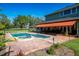 Inviting backyard oasis with a large pool and spa at 17120 Boy Scout Rd, Odessa, FL 33556