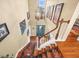 Elegant staircase with detailed railing and runner at 17120 Boy Scout Rd, Odessa, FL 33556