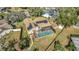 Aerial view of house with pool and solar panels at 1803 Tawnee Pl, Brandon, FL 33510