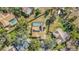 Overhead shot of house with solar panels and a screened-in pool at 1803 Tawnee Pl, Brandon, FL 33510