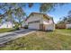 House exterior view, featuring a two car garage at 1803 Tawnee Pl, Brandon, FL 33510