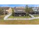 Aerial view of house and backyard with solar panels at 19231 Pepper Grass Dr, Tampa, FL 33647