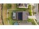 Aerial view of house with solar panels and pool at 19231 Pepper Grass Dr, Tampa, FL 33647