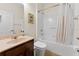 Clean bathroom with tub, shower, and vanity at 19231 Pepper Grass Dr, Tampa, FL 33647