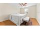 Bedroom with a king-size bed and hardwood floors at 19231 Pepper Grass Dr, Tampa, FL 33647