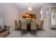 Dining room featuring a wood table, chairs, and art at 1937 Sterling Glen Ct, Sun City Center, FL 33573