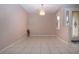 Simple dining area with tile floors and a chandelier at 1937 Sterling Glen Ct, Sun City Center, FL 33573