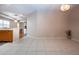 Bright dining room with tile floors and access to kitchen at 1937 Sterling Glen Ct, Sun City Center, FL 33573