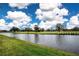 Serene golf course scenery with water features and lush fairways at 1937 Sterling Glen Ct, Sun City Center, FL 33573