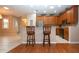 Kitchen with granite countertops and wood cabinets at 1937 Sterling Glen Ct, Sun City Center, FL 33573