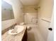 Bathroom with tub, shower, granite countertop and vanity at 2284 Spanish Dr # 26, Clearwater, FL 33763