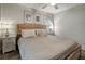 Cozy bedroom with rustic wood bed frame and neutral color scheme at 2715 14Th N Ave, St Petersburg, FL 33713