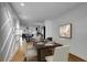 Bright dining room with hardwood floors and view into kitchen at 2715 14Th N Ave, St Petersburg, FL 33713