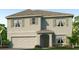 Two-story house featuring a neutral color scheme and shutters at 2927 Gardiner Ln, Zephyrhills, FL 33541