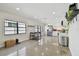 Modern white kitchen with stainless steel appliances at 2934 3Rd S Ave, St Petersburg, FL 33712