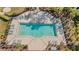 Community pool with multiple lounge chairs at 29913 Southwell Ln, Wesley Chapel, FL 33543