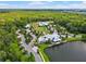 Community clubhouse near a lake with ample parking at 3421 Janna Grace Way, Land O Lakes, FL 34638