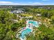 Resort-style pool with lap lanes and surrounding landscape at 3421 Janna Grace Way, Land O Lakes, FL 34638