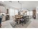 Casual dining area with a wooden table and neutral decor at 3421 Janna Grace Way, Land O Lakes, FL 34638