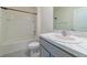 Simple bathroom with single vanity, shower/tub combo and toilet at 34219 Sorrel Mint Dr, Wesley Chapel, FL 33543