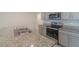 Kitchen with stainless steel appliances and granite countertops at 34219 Sorrel Mint Dr, Wesley Chapel, FL 33543