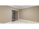 Bright bedroom with neutral walls and tile flooring at 36750 Us Highway 19 N # 04221, Palm Harbor, FL 34684