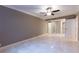 Bright bedroom featuring ample closet space and tile floors at 36750 Us Highway 19 N # 04221, Palm Harbor, FL 34684