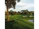 Scenic golf course with lush greens and sand traps at 36750 Us Highway 19 N # 04221, Palm Harbor, FL 34684